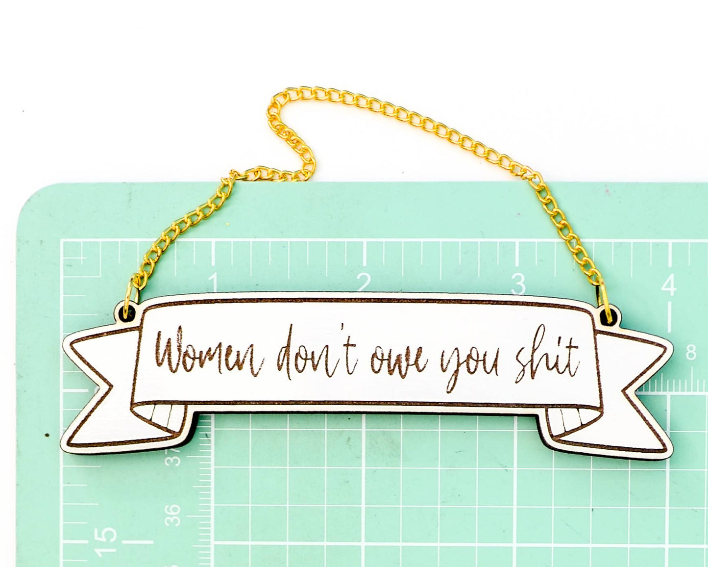 Women don't owe you sh*t banner